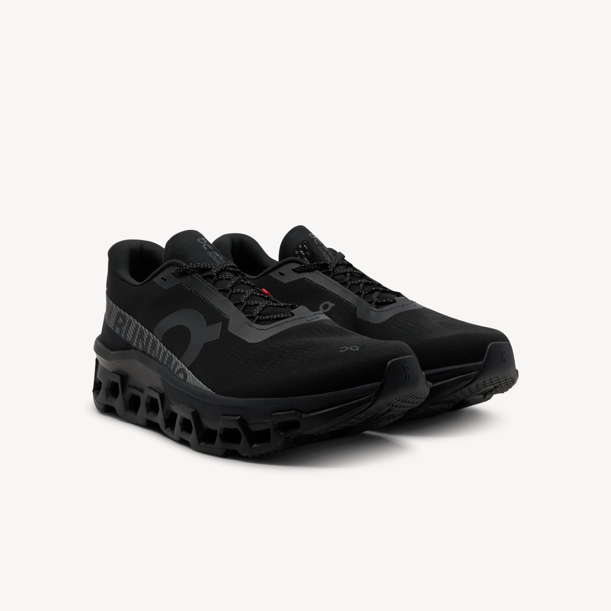 Side view of ON CLOUDMONSTER 2 features ultimate forward rolling feeling and plush ride quality at Profeet Footwear. Maximum cushioned running shoe for men. Expert-fitted.
