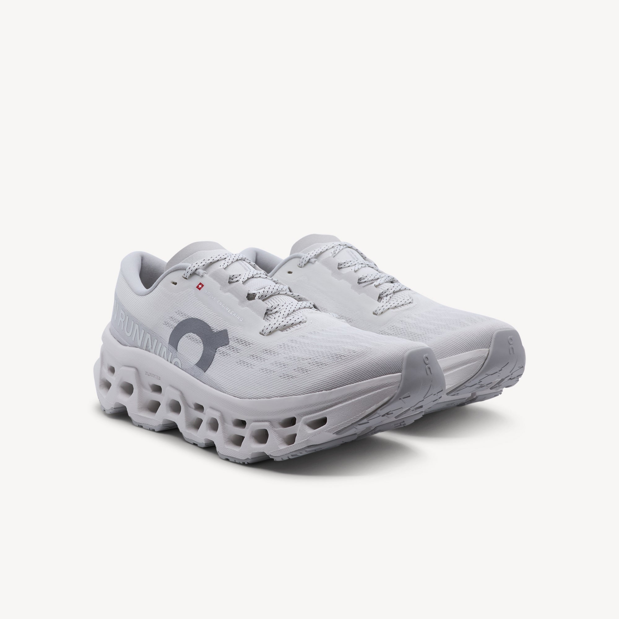 Side view of ON CLOUDMONSTER 3 features playful responsive ride and versatile performance at Profeet Footwear. Purpose-built running shoe. Expert-fitted.