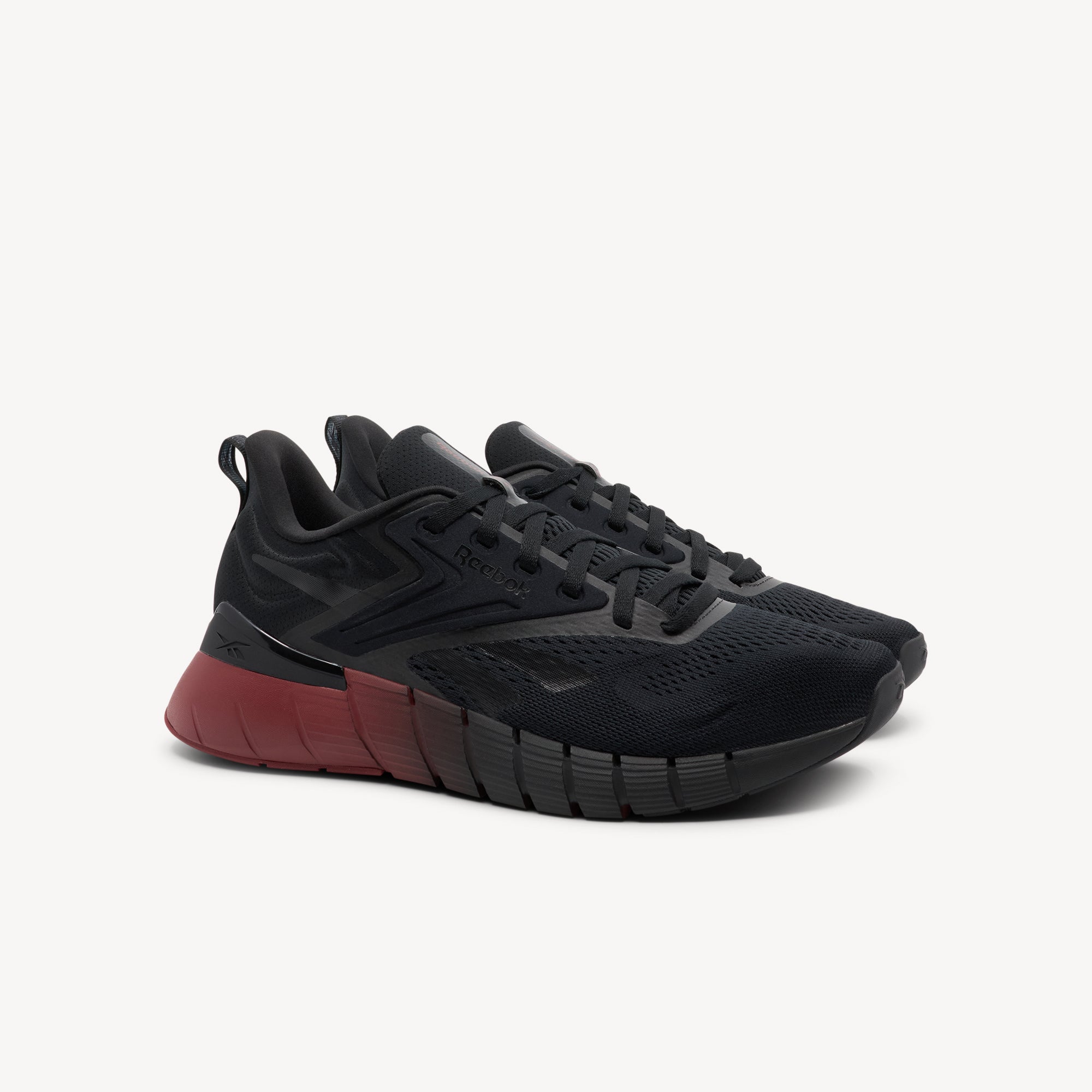 Side view of Reebok Nano Gym men's training shoes. They feature versatile performance for gym workouts at Profeet Footwear. Running shoe feel with training shoe DNA.