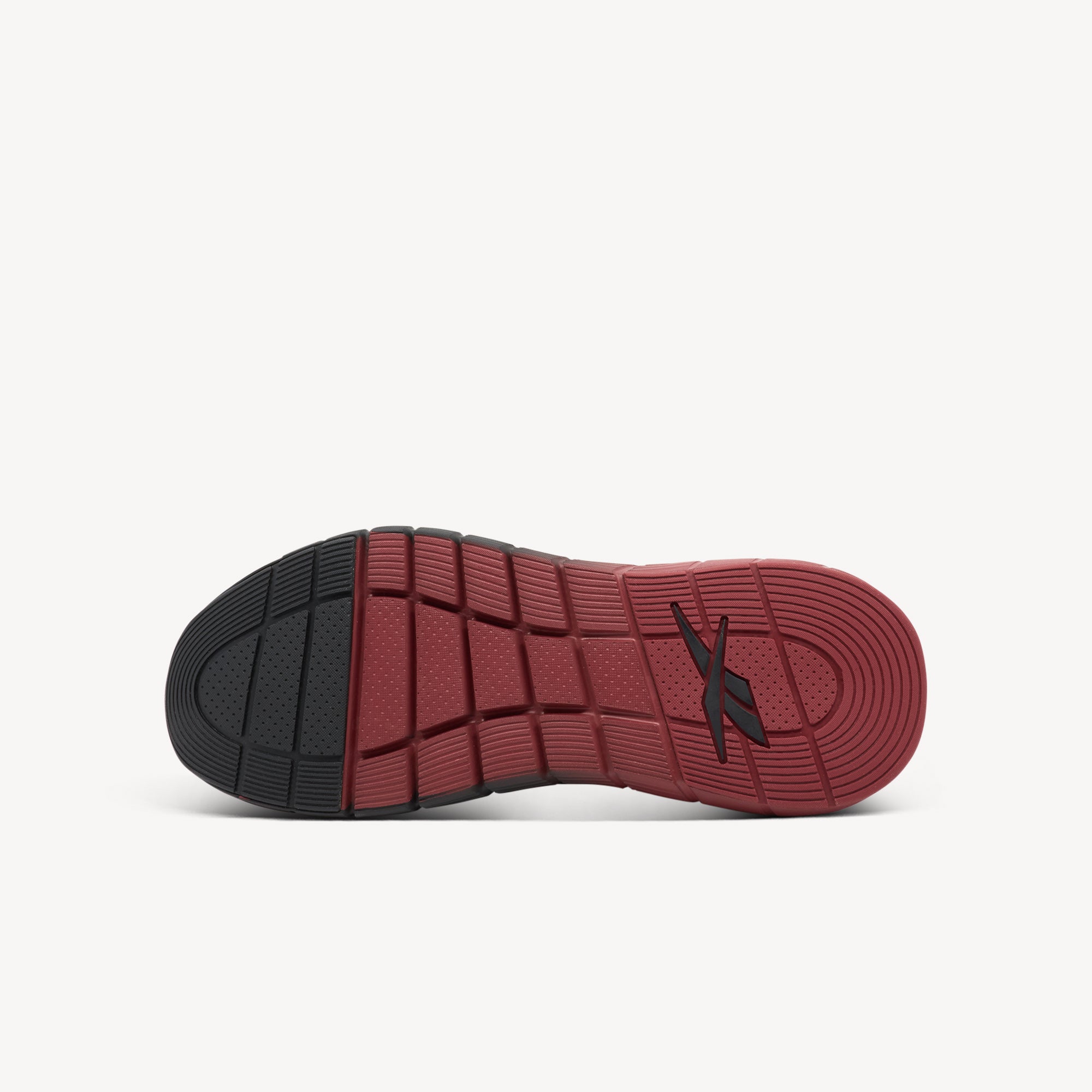 Outsole view of Reebok Nano Gym Mens. They feature a high-traction rubber outsole with strategic placement provides secure grip on treadmills and gym floors.
