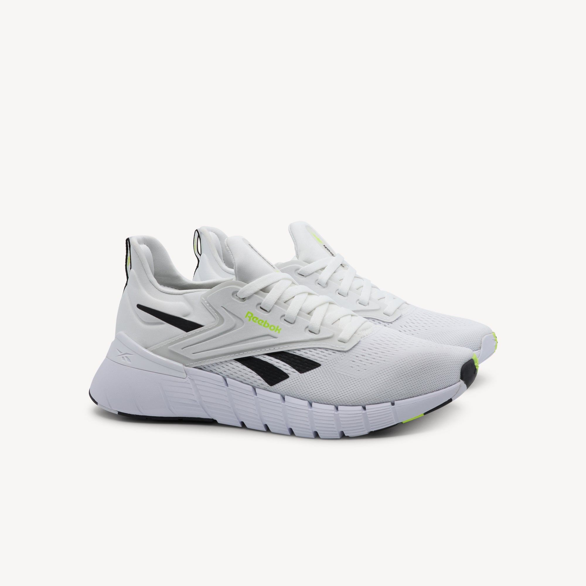 Side view of REEBOK NANO GYM features functional design and workout versatility at Profeet Footwear. Purpose-built training shoe for women. Expert-fitted.